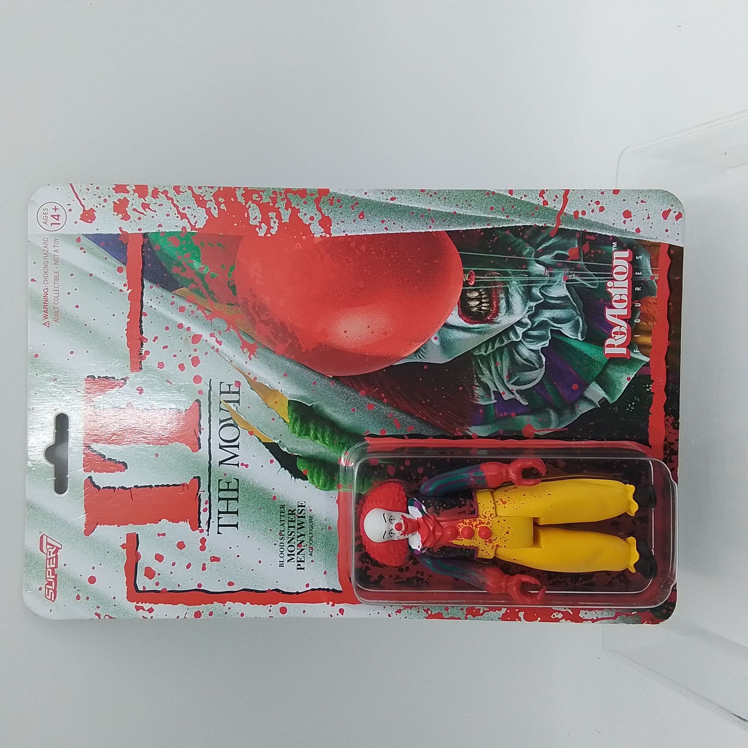 SUPER7 IT THE MOVIE BLOOD SPLATTER MONSTER PENNYWISE REACTION FIGURES 